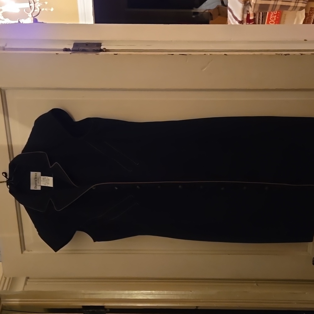 Black dress with tan trim and buttons